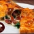 [Imagen:¡Paga Q65 en lugar de Q132 por 4 Pizzas Calzone de Jamón de Pavo, Pepperoni y Tocino + 4 Brownies + 4 Licuados de Frutas o 4 Bebidas Naturales!]