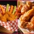 [Imagen:¡Paga $13.99 en Lugar de $26.97 por 2 Órdenes de 12 Alitas o Boneless c/u + 1 Orden de Papas Fritas + 2 Bebidas a Elección entre Cerveza Nacional o Soda!]