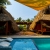 [Imagen:¡Escapada Perfecta a la Playa! ¡Paga Q365 en Lugar de Q850 por 1 Noche para 2 Personas en Cabaña Tipo Hawaii con Baño Privado o Habitaciones Dobles con Baño Privado + Snacks de Desayuno + Uso de Instalaciones: Piscina, Hamacas y Más!]