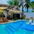 [Imagen:¡Escapada Perfecta a la Playa! ¡Paga Q349 en Lugar de Q850 por 1 Noche para 2 Personas en Cabaña Tipo Hawaii con Baño Privado o Habitaciones Dobles con Baño Privado + Snacks de Desayuno + Uso de Instalaciones: Piscina, Hamacas y Más!]