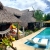 [Imagen:¡Escapada Perfecta a la Playa! ¡Paga Q349 en Lugar de Q850 por 1 Noche para 2 Personas en Cabaña Tipo Hawaii con Baño Privado o Habitaciones Dobles con Baño Privado + Snacks de Desayuno + Uso de Instalaciones: Piscina, Hamacas y Más!]
