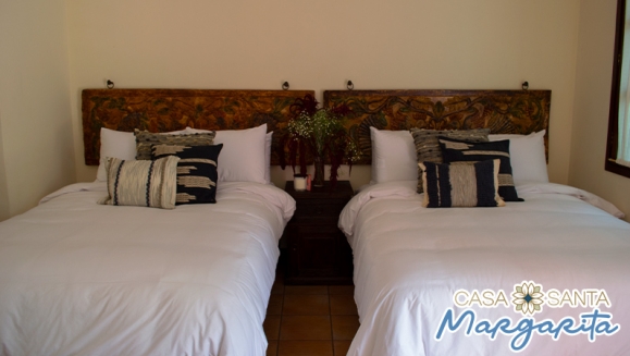[Imagen:¡Valido para fiestas agostinas! ¡Paga $75 en Lugar de $148.69 por Estadía Familiar en Antigua Guatemala para 2 Adultos y 2 Niños (Hasta 9 años) en Habitación Doble, TV, Parqueo, Impuestos Incluidos y Más!]