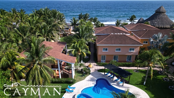 [Imagen:¡Playa, Relax y Confort en el Hotel Cayman Suites! ¡Paga Q737 en Lugar de Q1,046 por Estadía en Habitación Sencilla o Doble Para 2 Adultos y Hasta 2 Niños + Uso Ilimitado de Atractivas Instalaciones + Impuestos Incluidos!]