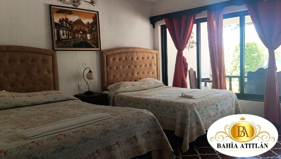 [Imagen:¡Inolvidable Estadía en Atitlán! ¡Paga Q350 en Lugar de Q650 por Estadía para 2 Personas en Habitación Doble + Uso de Piscina, Vista al Lago y Volcanes, Acceso a Playa Privada y Área Verde + Impuestos Incluidos!]