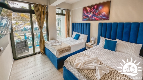 [Imagen:¡Paga Q540 en Lugar de Q900 por Estadía Familiar de 1 Noche Hasta Para 4 Personas en Monterrico: Habitación Doble con A/C + 2 Camas Matrimoniales + Ducha y Baño Privado + Televisión + Piscinas + Acceso a Playa Privada y Más!]