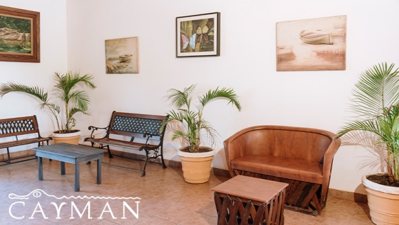 [Imagen:¡Playa, Relax y Confort en el Hotel Cayman Suites! ¡Paga Q737 en Lugar de Q1,046 por Estadía en Habitación Sencilla o Doble Para 2 Adultos y Hasta 2 Niños + Uso Ilimitado de Atractivas Instalaciones + Impuestos Incluidos!]