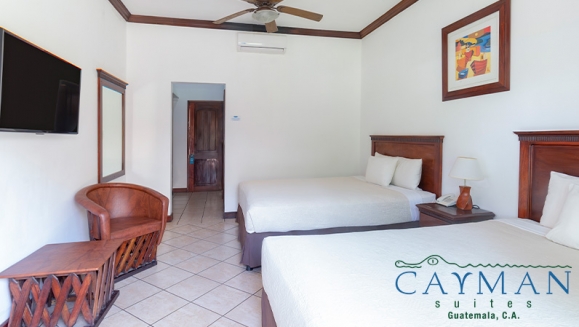 [Imagen:¡Playa, Relax y Confort en el Hotel Cayman Suites! ¡Paga Q829 en Vez de Q1,046 por Estadía en Habitación Sencilla o Doble Para 2 Adultos y Hasta 2 Niños + Desayunos + Playa + Piscinas + Uso Ilimitado de Atractivas Instalaciones + Impuestos Incluidos!]