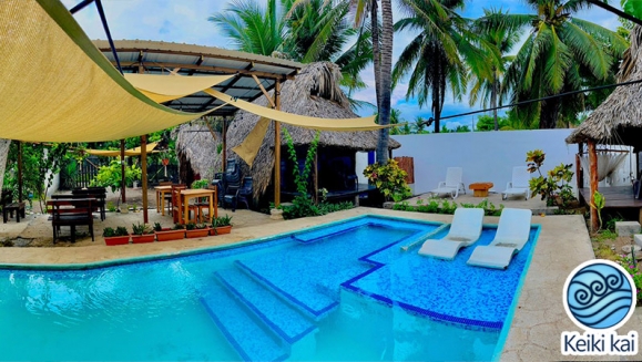 [Imagen:¡Escapada Perfecta a la Playa! ¡Paga Q349 en Lugar de Q850 por 1 Noche para 2 Personas en Cabaña Tipo Hawaii con Baño Privado o Habitaciones Dobles con Baño Privado + Snacks de Desayuno + Uso de Instalaciones: Piscina, Hamacas y Más!]