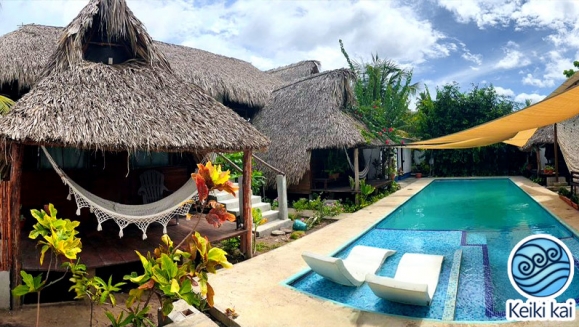 [Imagen:¡Escapada Perfecta a la Playa! ¡Paga Q349 en Lugar de Q850 por 1 Noche para 2 Personas en Cabaña Tipo Hawaii con Baño Privado o Habitaciones Dobles con Baño Privado + Snacks de Desayuno + Uso de Instalaciones: Piscina, Hamacas y Más!]