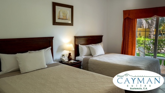 [Imagen:¡Playa, Relax y Confort en el Hotel Cayman Suites! ¡Paga Q829 en Vez de Q1,046 por Estadía en Habitación Sencilla o Doble Para 2 Adultos y Hasta 2 Niños + Desayunos + Playa + Piscinas + Uso Ilimitado de Atractivas Instalaciones + Impuestos Incluidos!]